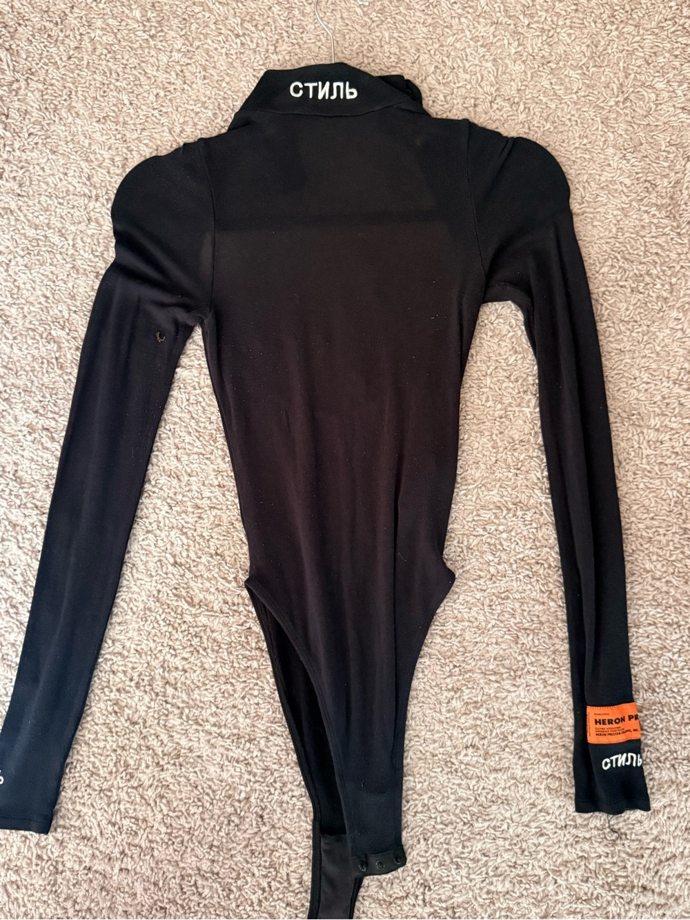 Heron Preston Black Long-Sleeve Kids One-Piece Bodysuit with White Neck Text